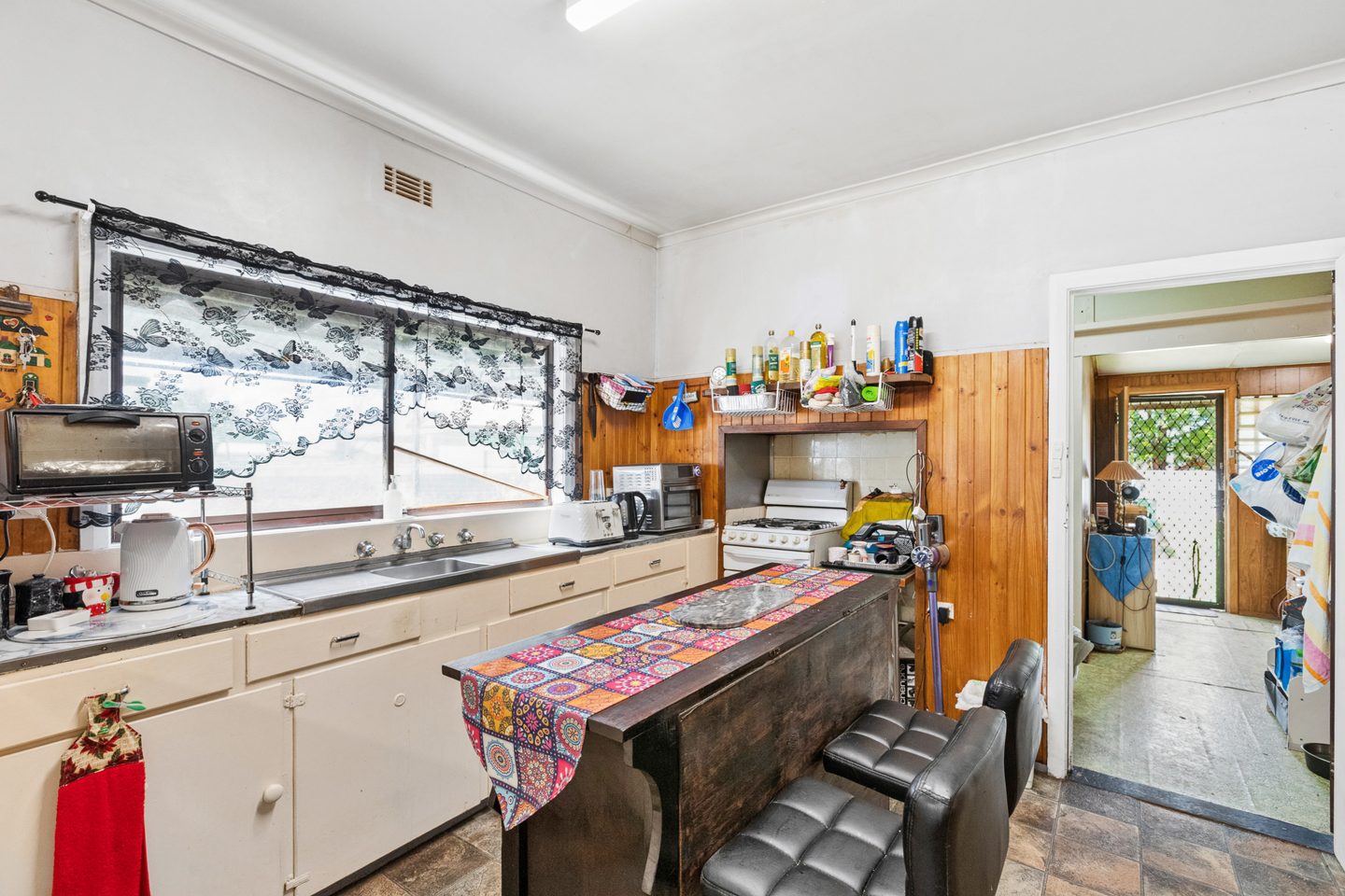 Kitchen sink, window and bench